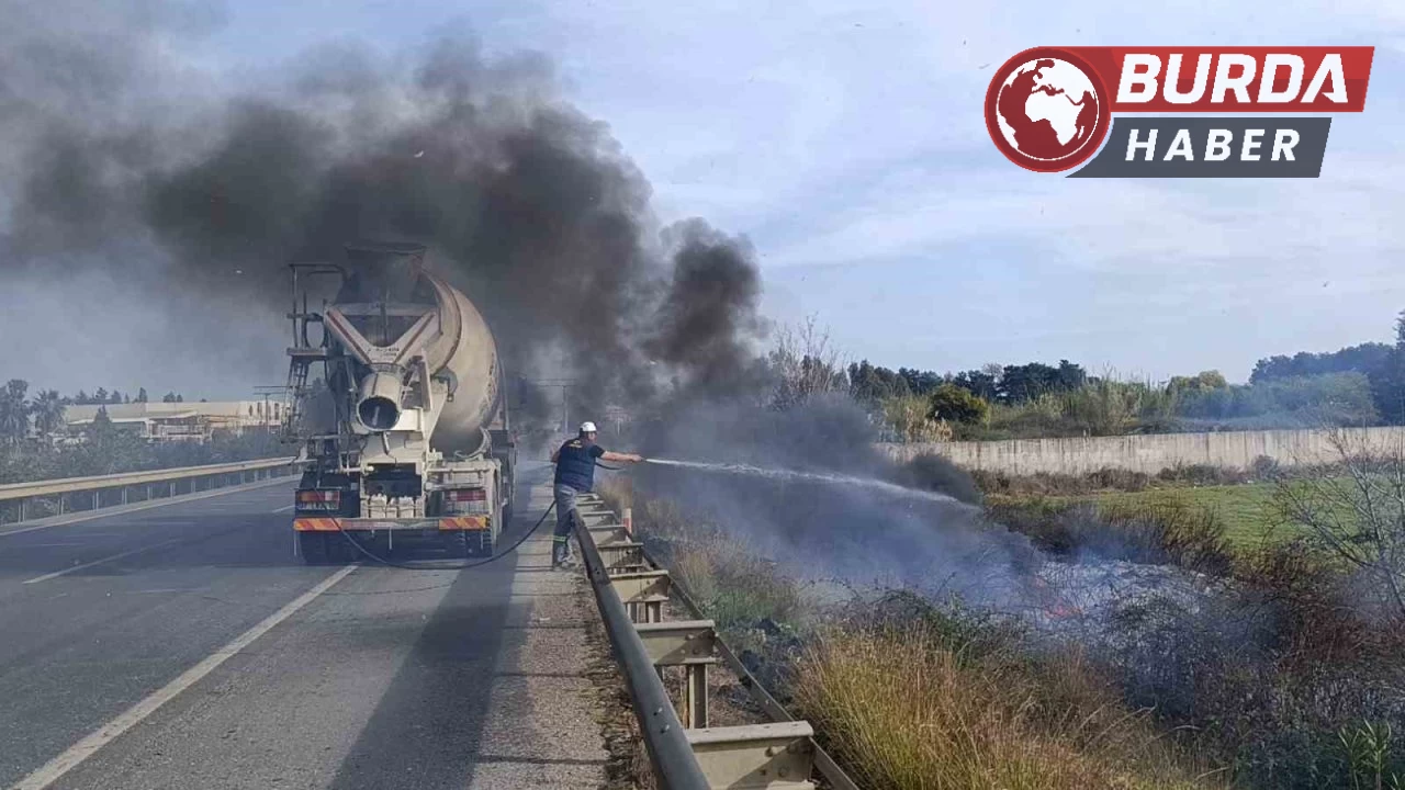 Araçtan atılan sigara yangın çıkardı,ilk müdahale beton mikserinden!